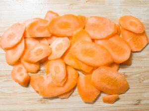 45-degree diagonal cut carrots on a chopping board