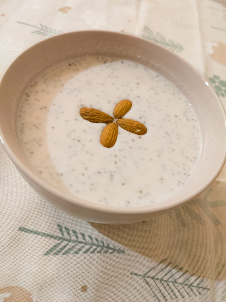 Overnight Oats in a cereal bowl on decorative fabric