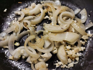 Sauteeing garlic and onion in a pan