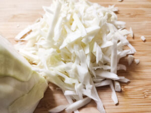 Sliced cabbage on a cutting board