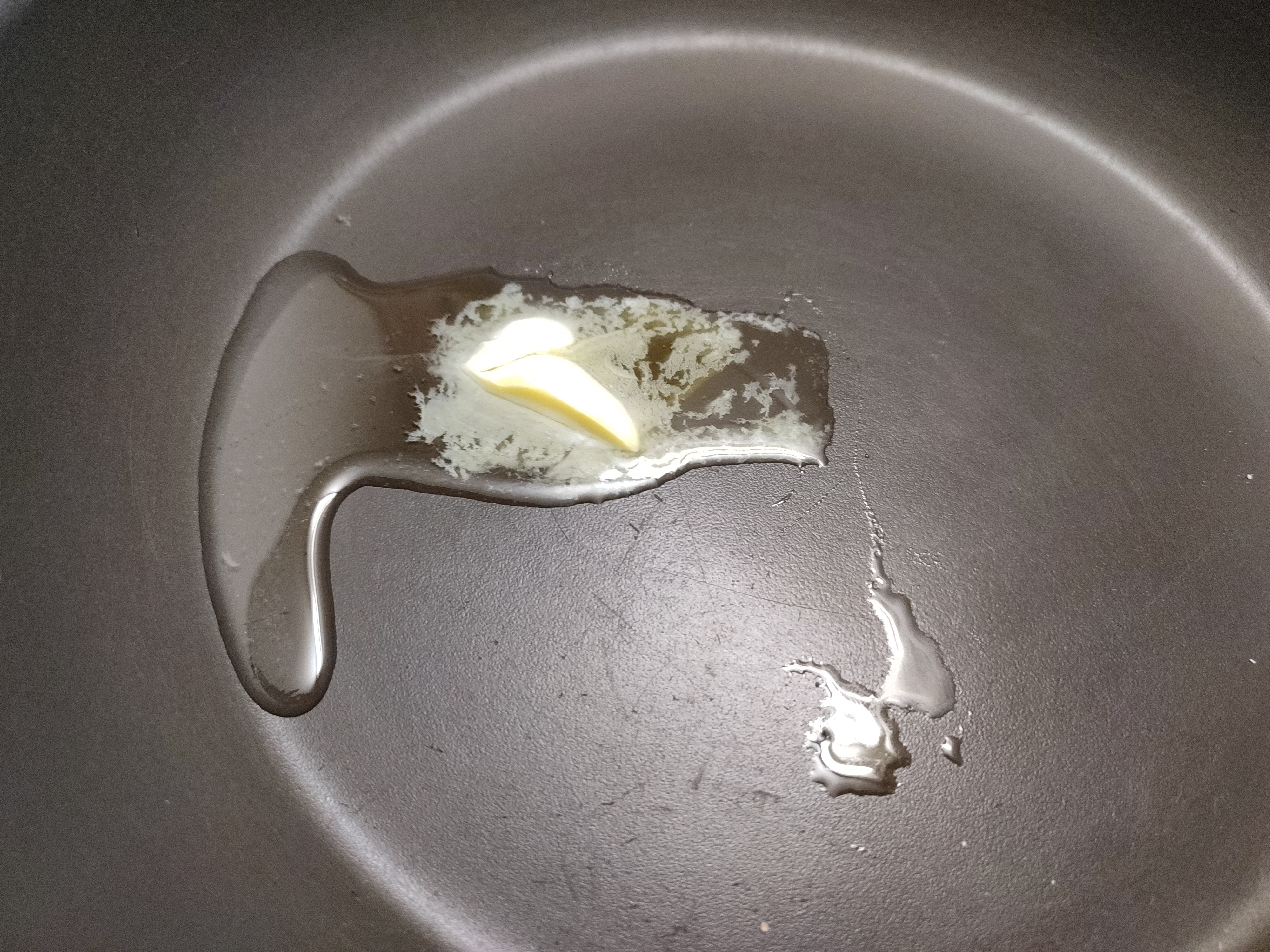 Heating butter and oil on a pan