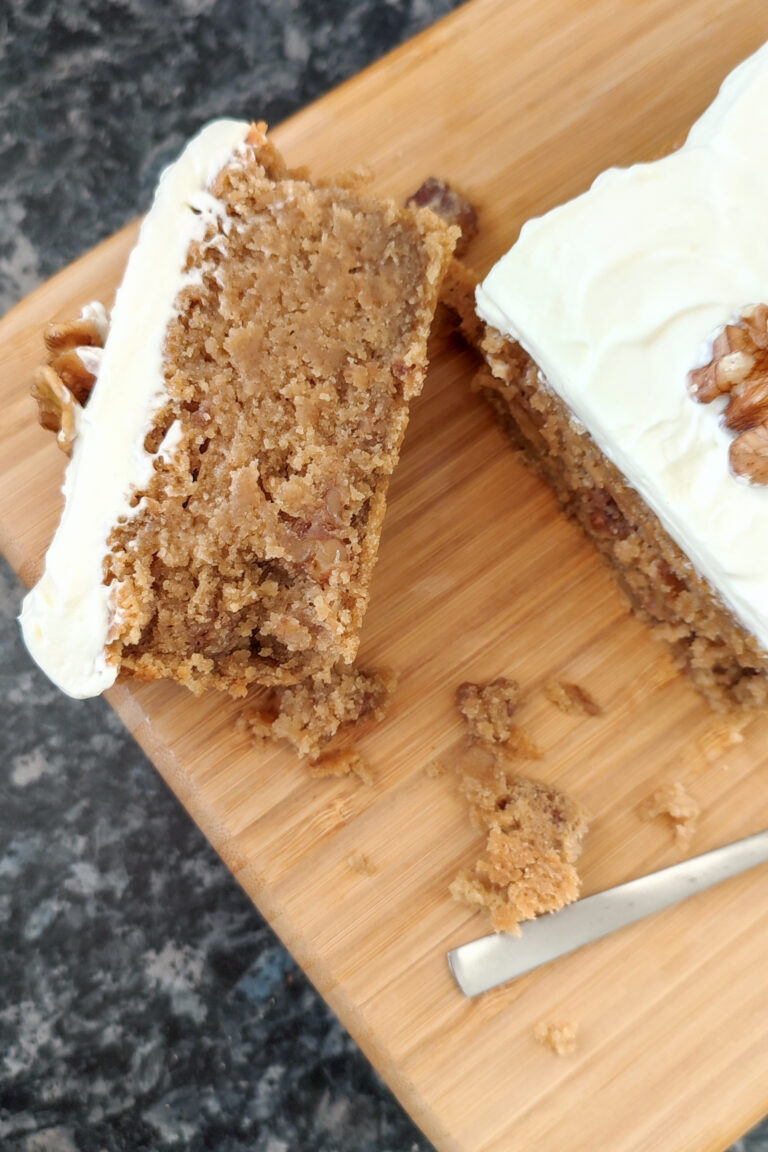 Coffee Walnut Mascarpone cake with Mascorpone Whipped Cream slice close up