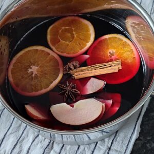 All of the Glühwein ingredients mixed together in a pot