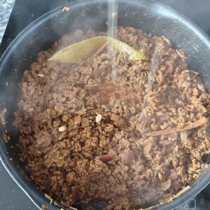 Adding lemon juice in the pan