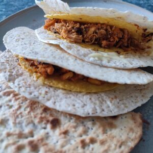 Crunchy Chicken Tacos on a grey plate ready to be served