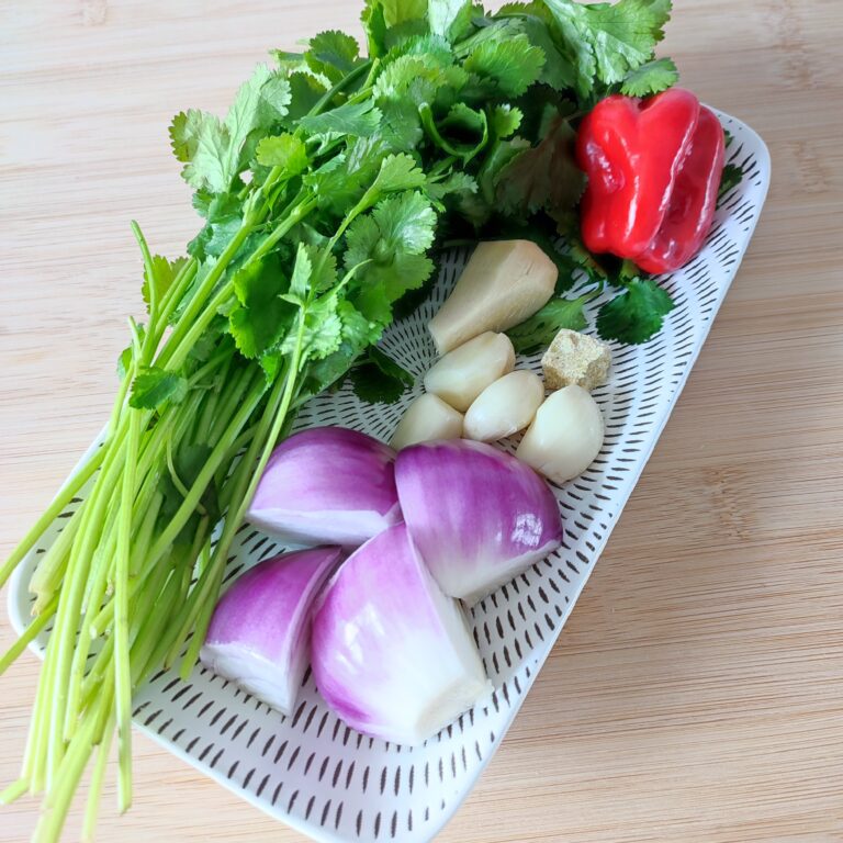 Marinade Mixture Ingredients on a black and white patterned rectangular plate on a working surface