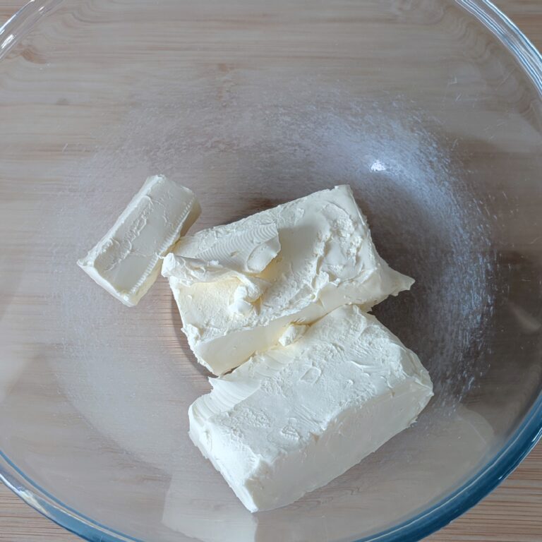 Cream cheese in a large clear bowl