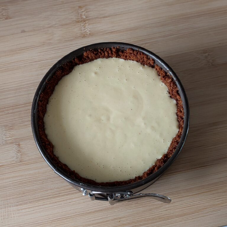 Poured the crem cheese mixture into the mould/tin lined with cookie butter mixture that was baked earlier