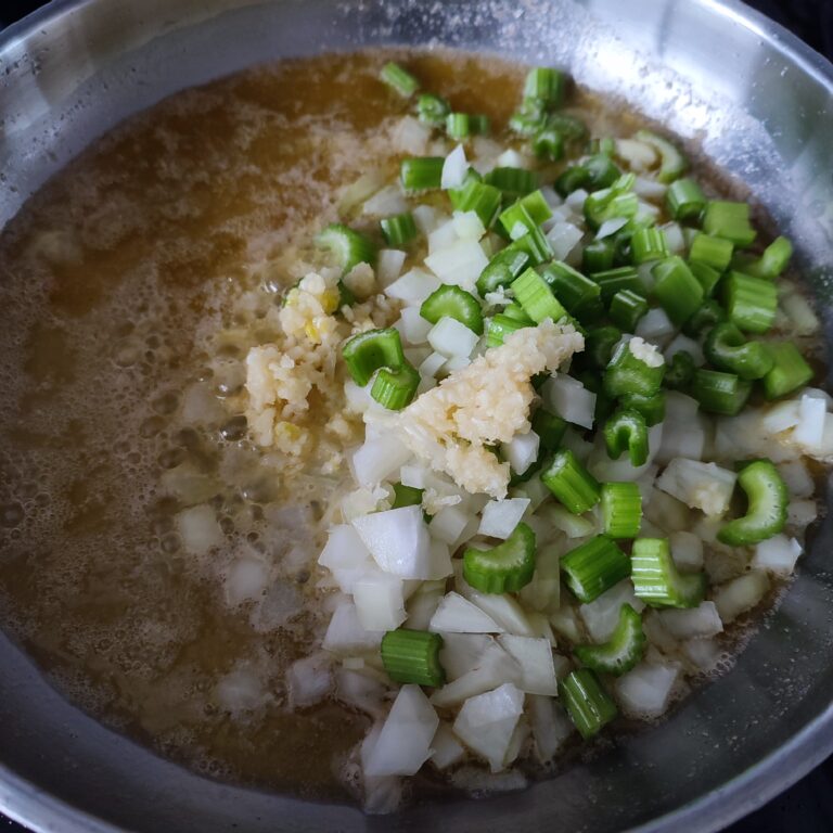 Added the prepped vegetables to the melted butter in a large skillet