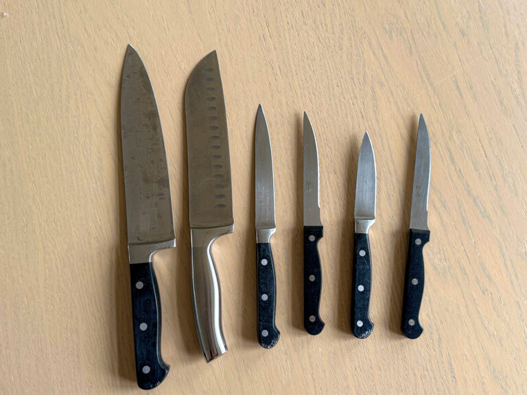 Different types and sizes knifes on a table
