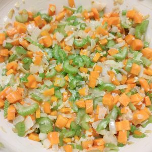 Add celery and carrots in a Dutch oven