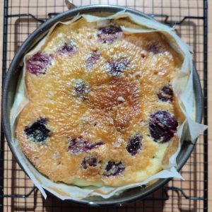 Clafoutis (after baking) in the baking pan on a cooling rack