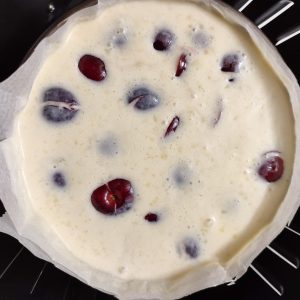 Clafoutis (before baking) in a baking pan on a airfryer basket