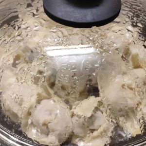 Quick steaming the potstickers in a shallow frying pan with lid on