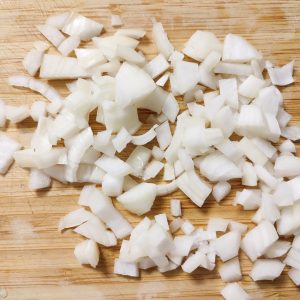 Cubed white onions on a cutting board