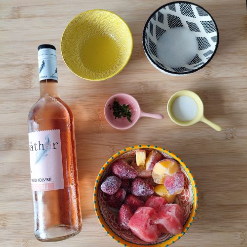 Ingredients for Frosé Punch on a working surface