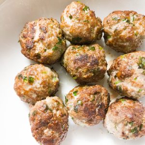 Fried polpette in a white bowl