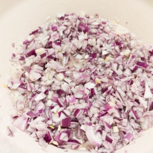 Chopped onions in a casserole pan