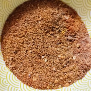 Berbere spice mix in a yellow patterned bowl