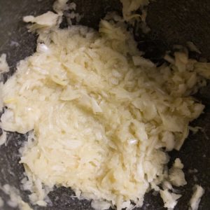 Ginger and garlic paste in a mortar