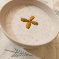 Overnight Oats in a cereal bowl on decorative fabric